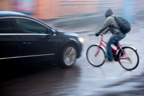 biker about to hit a car