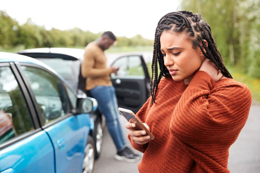 Drivers following a car crash making phone calls