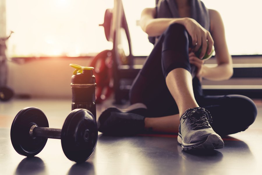 Woman on the floor after a workout injury