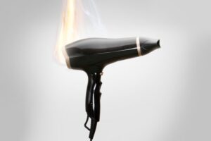 Defective hair dryer catching on fire