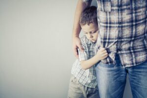 Young boy hugging his dad