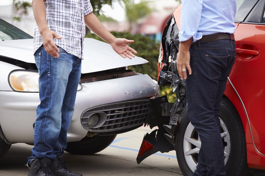 Two Drivers Arguing After Traffic Accident.