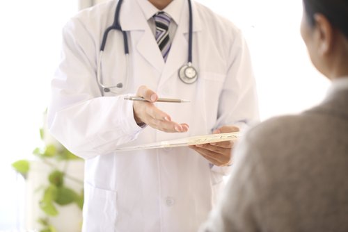 doctor explaining something to patient